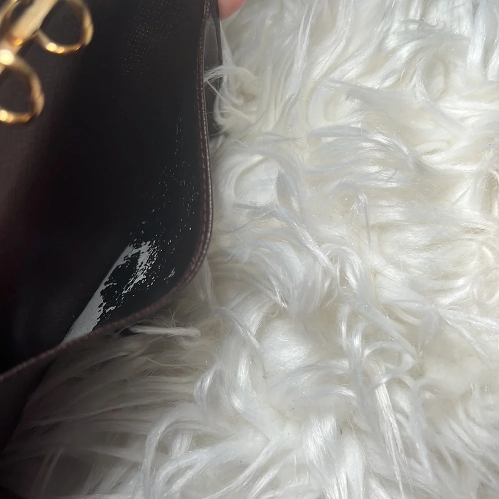 Louis Vuitton please see